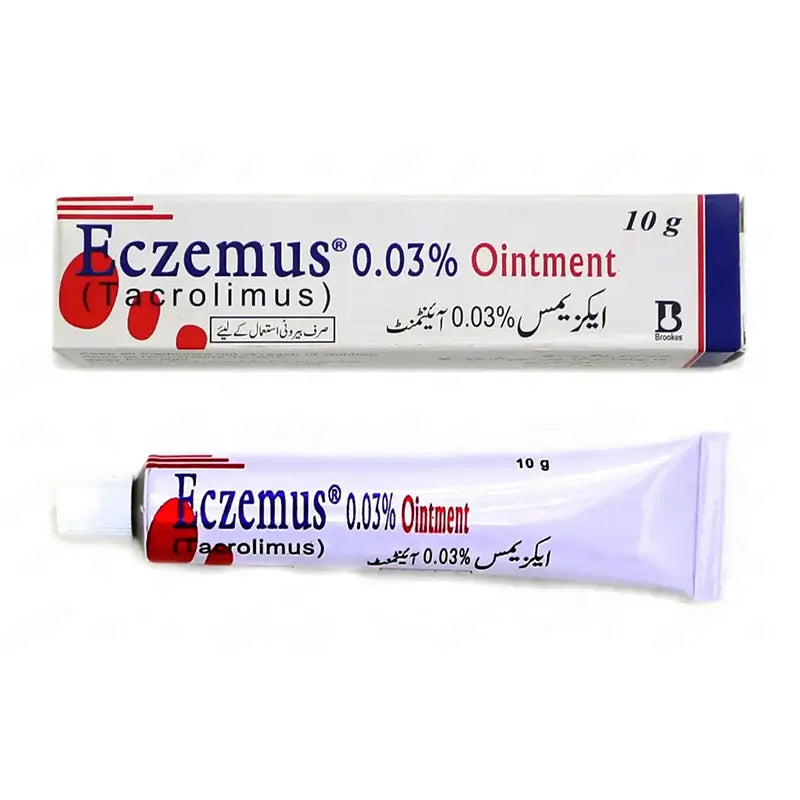 Tube of Eczemus ointment next to a prescription slip on a pharmacy counter in Pakistan