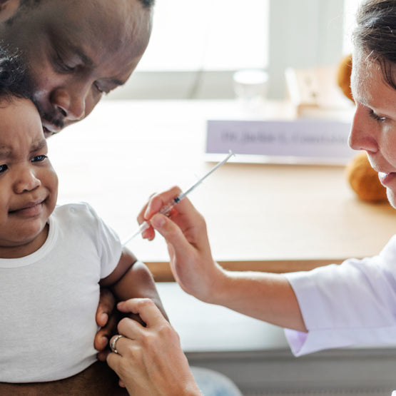 How can I tell if my child is having a bad reaction to a vaccine?