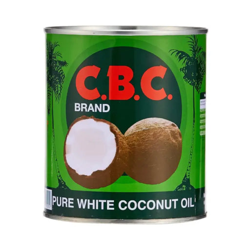 C.B.C. brand can of pure white coconut oil with a green label and coconut illustration.