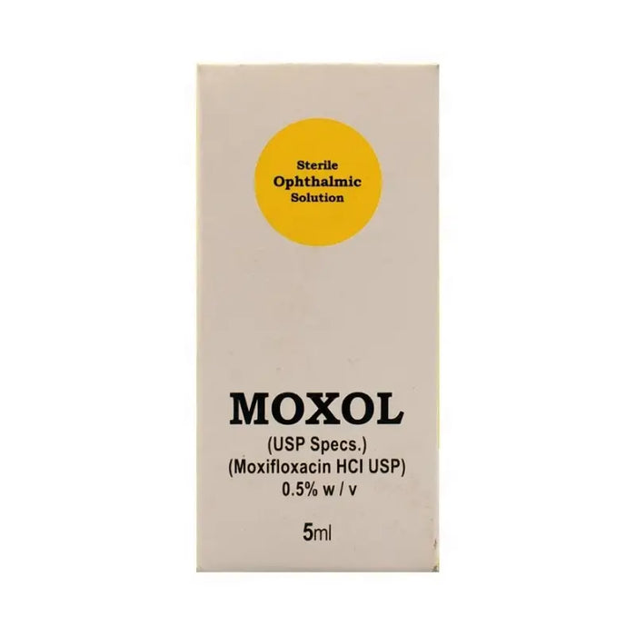 Moxol ophthalmic solution packaging with a yellow circle and text on a beige background