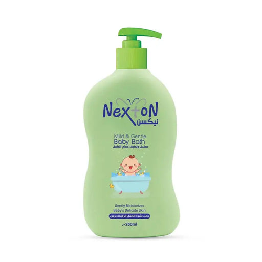 Green bottle of Nexton baby bath with a pump on a white background