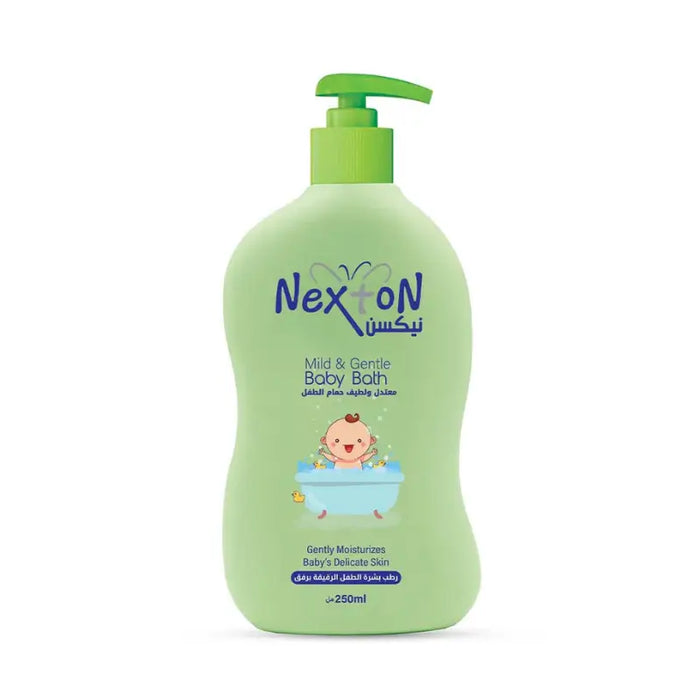 Green bottle of Nexton baby bath with a pump on a white background