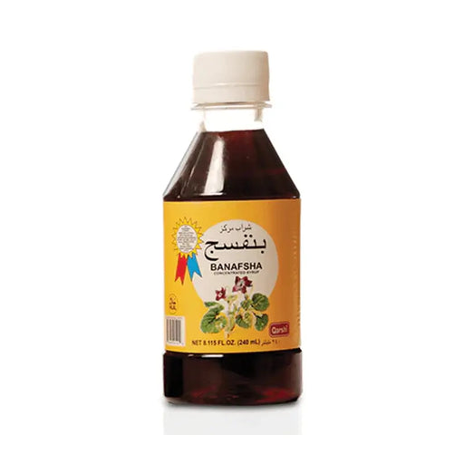 Bottle of Banafsha syrup with a white background
