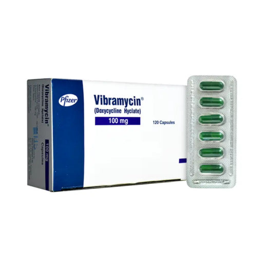 Vibramycin packaging with green capsules on a white background